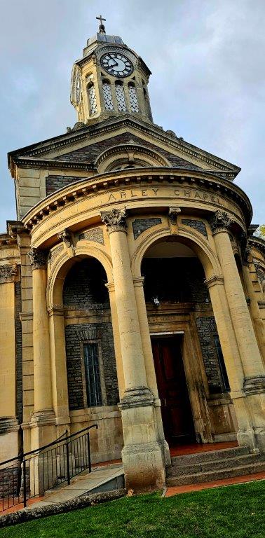 Arley Chapel, a Grade II listed 1855 chapel with a clock tower, now a Polish Roman Catholic church