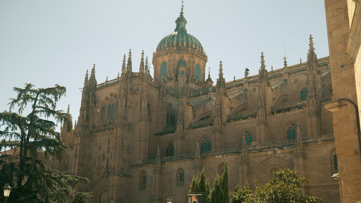 The dome and pinnacles of Salamanca Cathedral in warm light