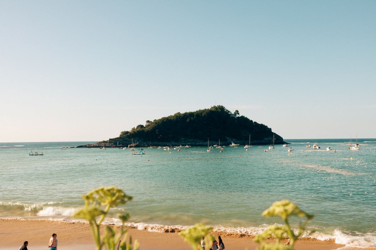 Santa Clara island seen from La Concha Beach in San Sebastian on a summer evening